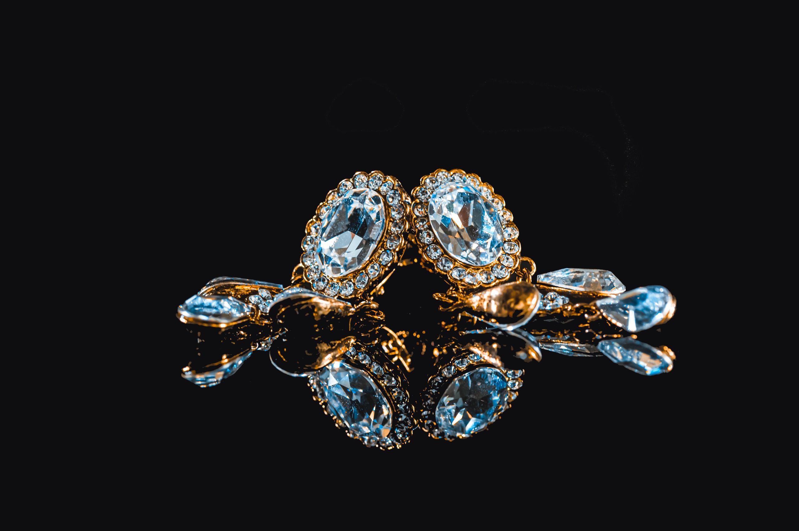 Elegant earring jewelry set on a dark background